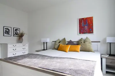 Ein Bett oder Betten in einem Zimmer der Unterkunft Ferienwohnung Strandluft - Niendorf Ostsee