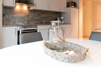 Küche/Küchenzeile in der Unterkunft Ferienwohnung Beach Life 3 - Scharbeutz