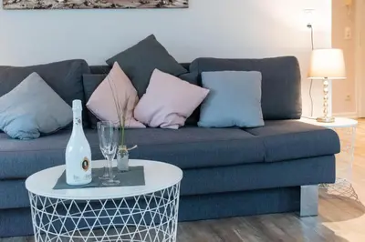 Ein Sitzbereich in der Unterkunft Ferienwohnung Beach Life 4 - Scharbeutz
