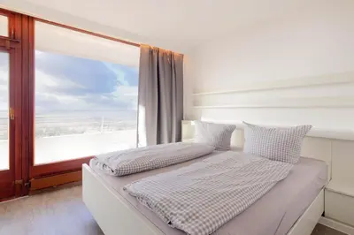 Ein Bett oder Betten in einem Zimmer der Unterkunft Residenz App 373 - Timmendorfer Strand