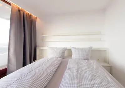 Ein Bett oder Betten in einem Zimmer der Unterkunft Residenz App 373 - Timmendorfer Strand