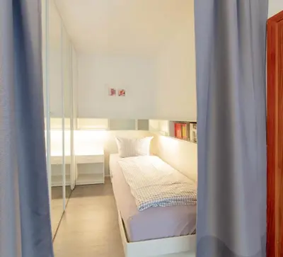 Ein Bett oder Betten in einem Zimmer der Unterkunft Residenz App 373 - Timmendorfer Strand