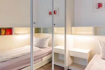 Ein Bett oder Betten in einem Zimmer der Unterkunft Residenz App 373 - Timmendorfer Strand