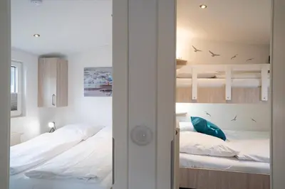 Ein Bett oder Betten in einem Zimmer der Unterkunft Ferienhaus 