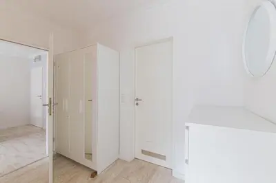 Ein Bett oder Betten in einem Zimmer der Unterkunft Ferienwohnung Strandkörbchen - Scharbeutz