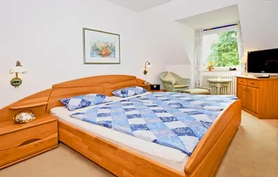 Ein Bett oder Betten in einem Zimmer der Unterkunft Domizil Strandburg Domizil Strandburg Appartement 13 Ferienwohnung Bremen