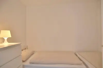 Ein Bett oder Betten in einem Zimmer der Unterkunft Strandresidenz Timmendorfer Strand Strandresidenz Appartement 108