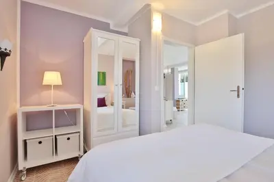 Ein Bett oder Betten in einem Zimmer der Unterkunft Ferienbungalow Erlenweg 20 Erlenweg 20 Appartement 1 Niendorf Ostsee