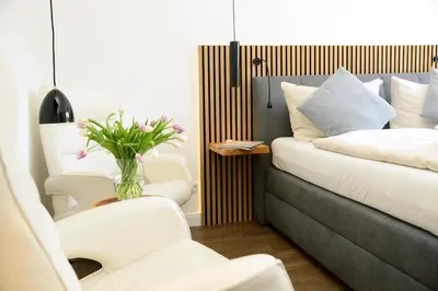 Ein Bett oder Betten in einem Zimmer der Unterkunft Am Rosenhain 14 Am Rosenhain 14 Appartement 3