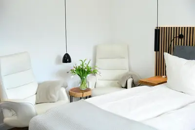 Ein Bett oder Betten in einem Zimmer der Unterkunft Am Rosenhain 14 Am Rosenhain 14 Appartement 3