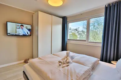Ein Bett oder Betten in einem Zimmer der Unterkunft Strandglück Haus C Strandglück Appartement Strand 6