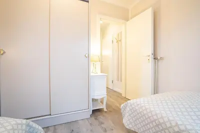 Ein Bett oder Betten in einem Zimmer der Unterkunft Muschelbank
