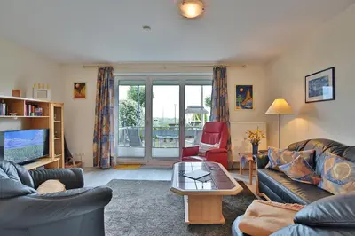 Ein Sitzbereich in der Unterkunft Strandduene Stranddüne Appartement 4