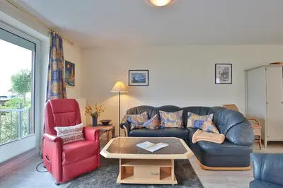 Ein Sitzbereich in der Unterkunft Strandduene Stranddüne Appartement 4