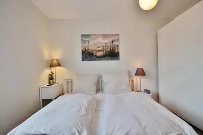 Ein Bett oder Betten in einem Zimmer der Unterkunft Strandhotel - Niendorf Strandhotel Niendorf Appartement 32