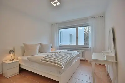 Ein Bett oder Betten in einem Zimmer der Unterkunft Domizil Strandallee 30 Domizil Strandallee 30 Appartement 28