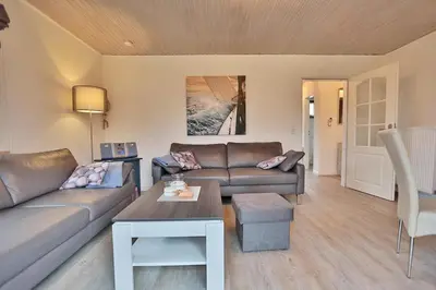 Ein Sitzbereich in der Unterkunft Ferienhaus Ahornweg Niendorf Ostsee Ahornweg Niendorf Ostsee