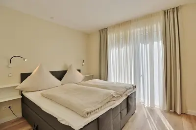 Ein Bett oder Betten in einem Zimmer der Unterkunft Villa Stern Villa Stern Appartement 02