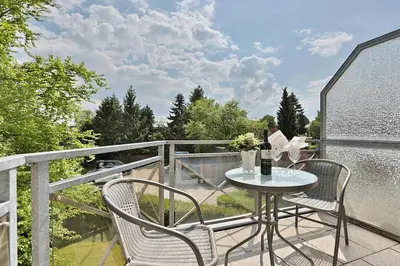 Ein Balkon oder eine Terrasse in der Unterkunft Haus Parkblick, Timmendorfer Strand Haus Parkblick Appartement 11