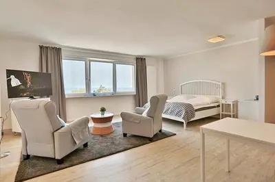 Ein Bett oder Betten in einem Zimmer der Unterkunft Haus Seebrücke Haus Seebrücke Appartement 10