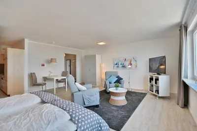 Ein Bett oder Betten in einem Zimmer der Unterkunft Haus Seebrücke Haus Seebrücke Appartement 10