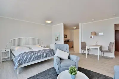 Ein Bett oder Betten in einem Zimmer der Unterkunft Haus Seebrücke Haus Seebrücke Appartement 10