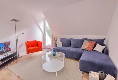 Ein Sitzbereich in der Unterkunft Haus Lubecca Ferienhaus Lubecca Appartement 01