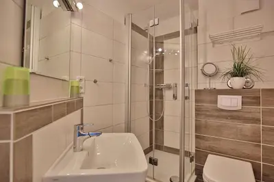 Ein Badezimmer in der Unterkunft Appartements Windrose Appartements Windrose Appartement 14