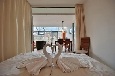 Ein Bett oder Betten in einem Zimmer der Unterkunft Strandhotel - Niendorf Strandhotel Niendorf Appartement 48