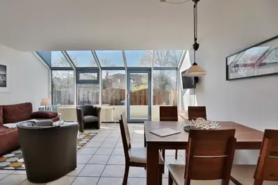 Ein Sitzbereich in der Unterkunft Strandhotel - Niendorf Strandhotel Niendorf Appartement 48