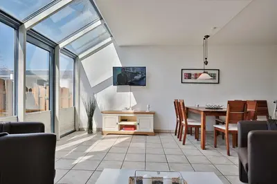 TV/Unterhaltungsangebot in der Unterkunft Strandhotel - Niendorf Strandhotel Niendorf Appartement 48