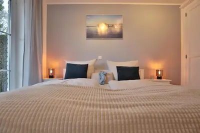 Ein Bett oder Betten in einem Zimmer der Unterkunft Bädervilla Bergstraße 30 Bädervilla Bergstraße Appartement 2