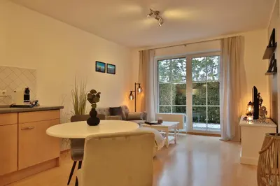 Ein Sitzbereich in der Unterkunft Bädervilla Bergstraße 30 Bädervilla Bergstraße Appartement 2