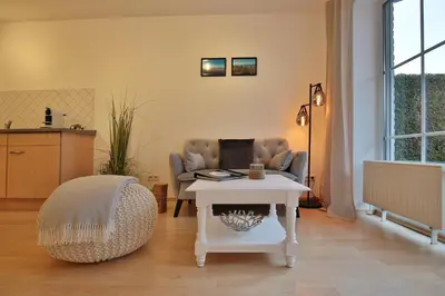 Ein Sitzbereich in der Unterkunft Bädervilla Bergstraße 30 Bädervilla Bergstraße Appartement 2
