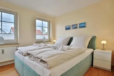 Ein Bett oder Betten in einem Zimmer der Unterkunft Gorch-Fock-Park Haus 02 Gorch-Fock-Park 2 Appartement 15