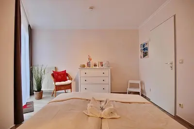Ein Bett oder Betten in einem Zimmer der Unterkunft Am Rosenhain 9 Am Rosenhain 9 Appartement 3