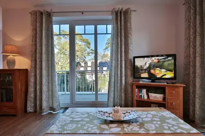 TV/Unterhaltungsangebot in der Unterkunft Villa am Meer Villa am Meer Strandallee 48 Appartement 10