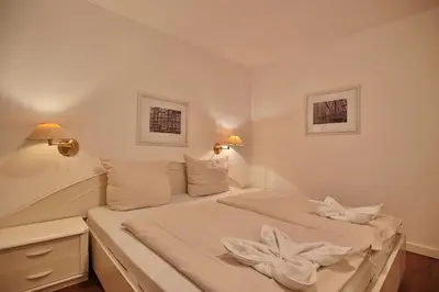 Ein Bett oder Betten in einem Zimmer der Unterkunft Gorch-Fock-Park Haus 02 Gorch Fock Park 2 Appartement 02