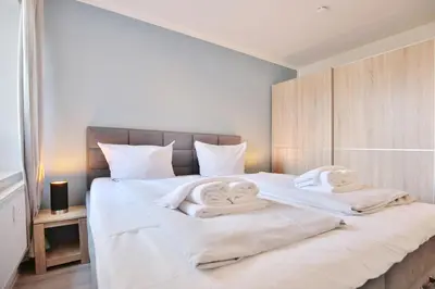 Ein Bett oder Betten in einem Zimmer der Unterkunft Am Elchgrund, im Brook 9 Am Elchgrund Im Brook 9 Appartement 09