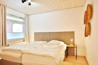 Ein Bett oder Betten in einem Zimmer der Unterkunft Gorch-Fock-Park Haus 02 Gorch-Fock-Park 2 Appartement 10
