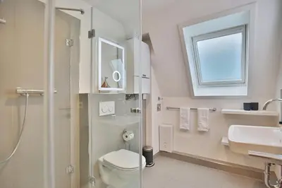 Ein Badezimmer in der Unterkunft Haus Wiesenweg Haus Wiesenweg Appartement 7