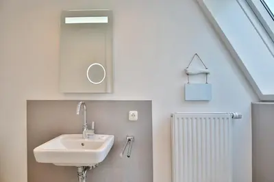 Ein Badezimmer in der Unterkunft Haus Wiesenweg Haus Wiesenweg Appartement 7