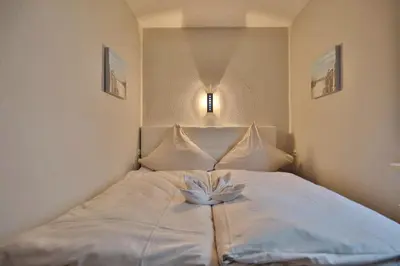 Ein Bett oder Betten in einem Zimmer der Unterkunft Domizil Strandallee 180 Domizil Strandallee 180 Appartement 5