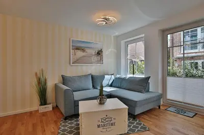 Ein Sitzbereich in der Unterkunft Residenz Wolburgstraße 49 Residenz Seemuschel Wolburgstr 49 Appartement 02