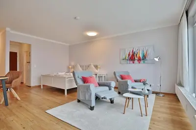 Ein Sitzbereich in der Unterkunft Haus Seebrücke Haus Seebrücke Appartement 02