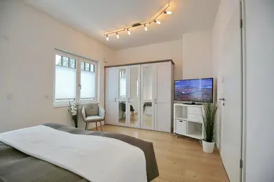 Ein Bett oder Betten in einem Zimmer der Unterkunft Villa Frankfurt Villa Frankfurt Appartement 01