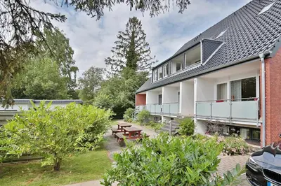 Ein Garten an der Unterkunft Poststrasse 56 Poststraße 56 Appartement 05 Strandurlaub