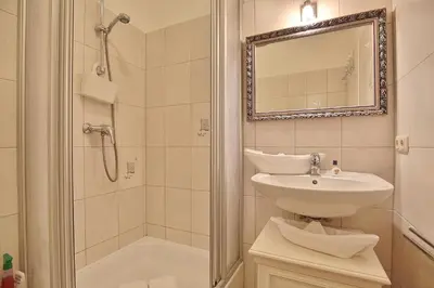 Ein Badezimmer in der Unterkunft Poststrasse 56 Poststraße 56 Appartement 05 Strandurlaub
