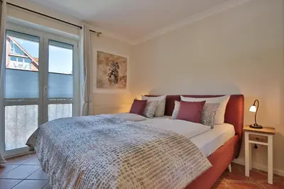 Ein Bett oder Betten in einem Zimmer der Unterkunft Gorch-Fock-Straße 16 Gorch-Fock-Str 16a Appartement 10
