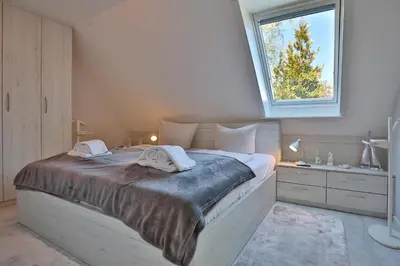 Ein Bett oder Betten in einem Zimmer der Unterkunft Im Brook 36-38 Am Elchgrund Appartement 10